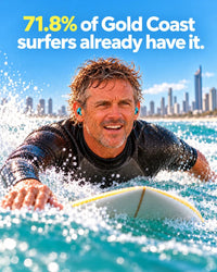 71.8% of Gold Coast surfers already have surfer's ear: a surfer paddling out wearing ColdWall Plugs